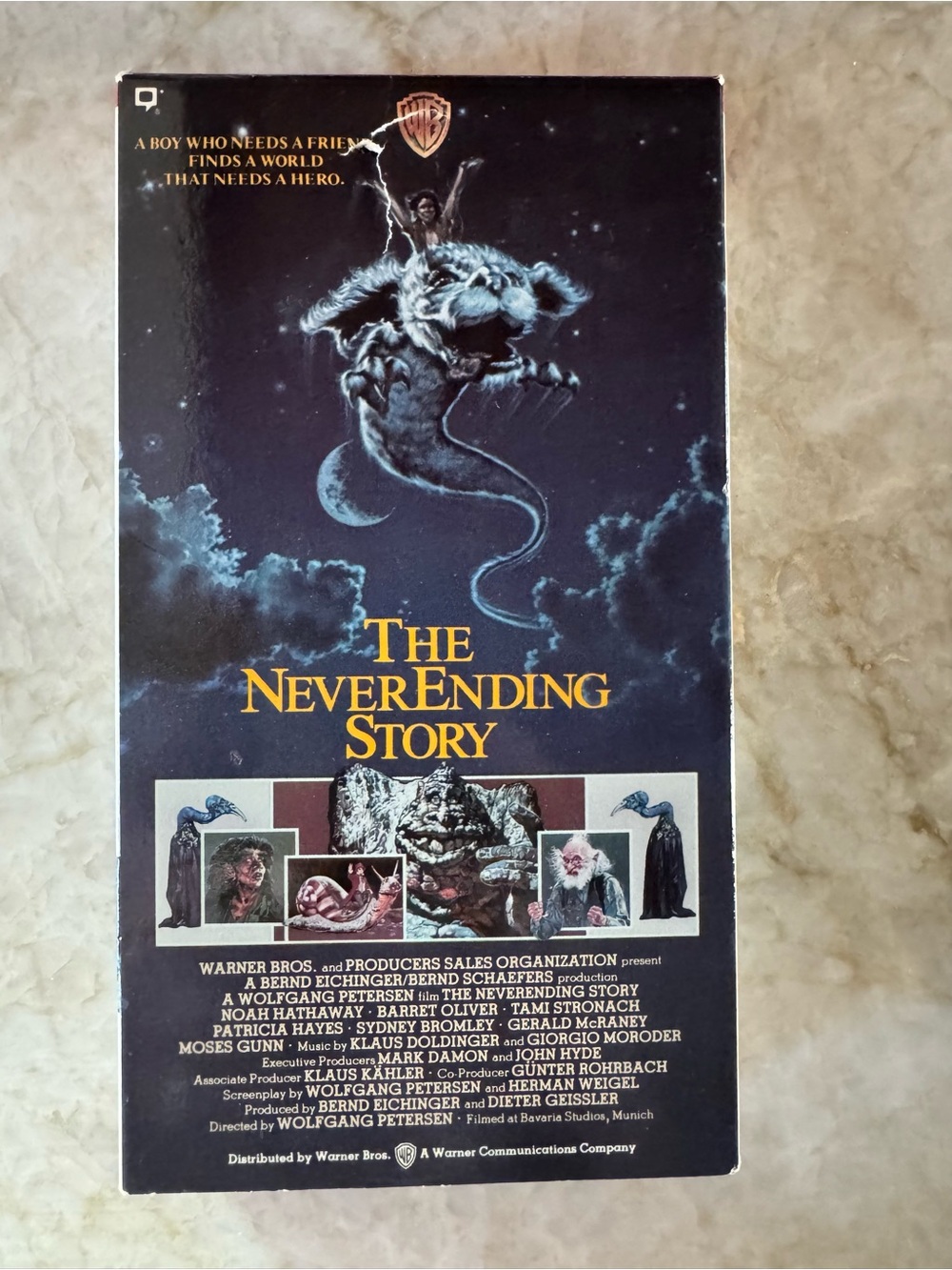 Warner Bros. VHS Cover — White, Red, Purple, Black